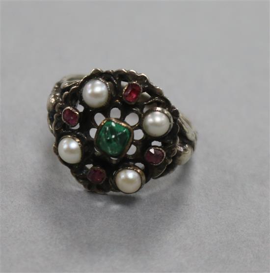 An Art and Crafts white metal and gem set ring, size Q.